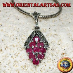 Silver pendant with 9 natural round rubies set with rhombus and marcasite