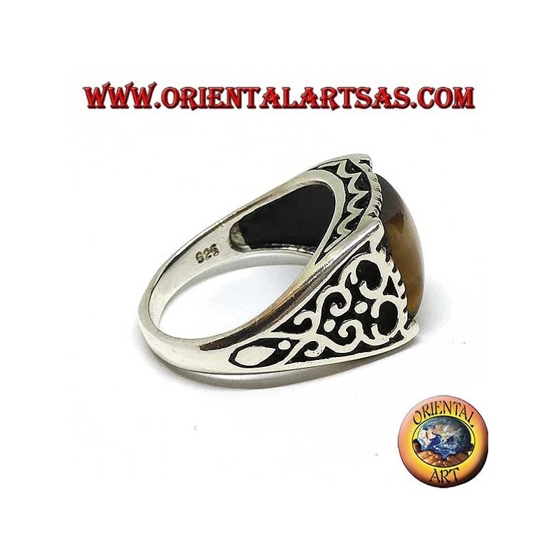Silver ring with baroque decorations and rectangular Tiger eye