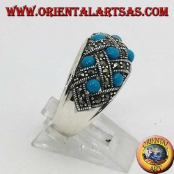 Silver ring with curved band with ten spherical turquoises topped with marcasite