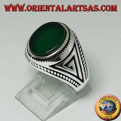 Silver ring with flat oval green agate with braid at the edges of the ring