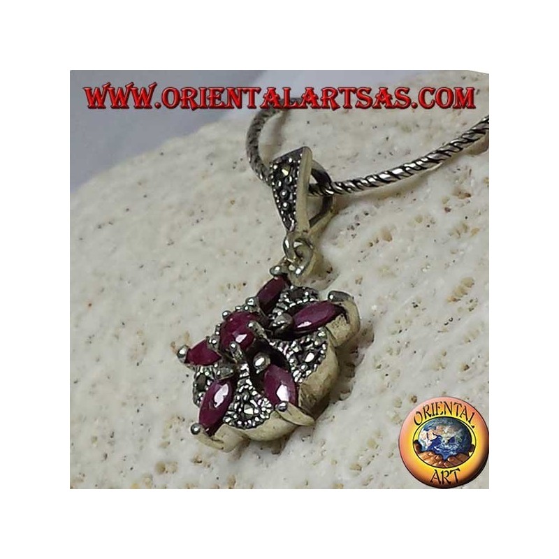 Pendentif en argent avec 5 rubis naturels dans une navette + 1 tour pour former une étoile et marcassite