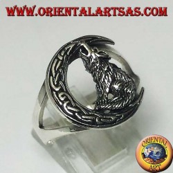 Silver wolf ring howling at the crescent with a Celtic knot