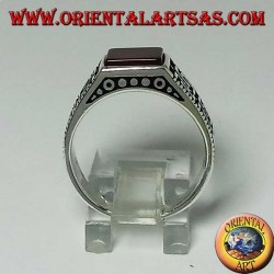 Silver ring with flat square carnelian and two rows of Greek on the sides