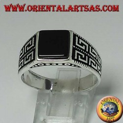 Silver ring with flat square onyx and two rows of Greek on the sides