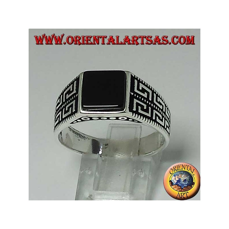 Silver ring with flat square onyx and two rows of Greek on the sides