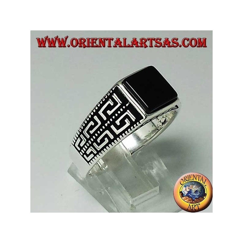 Silver ring with flat square onyx and two rows of Greek on the sides