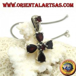 Silver pendant in the shape of a four-leaf clover with drop and round garnets