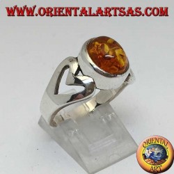 Silver ring with oval amber and openwork heart on the sides