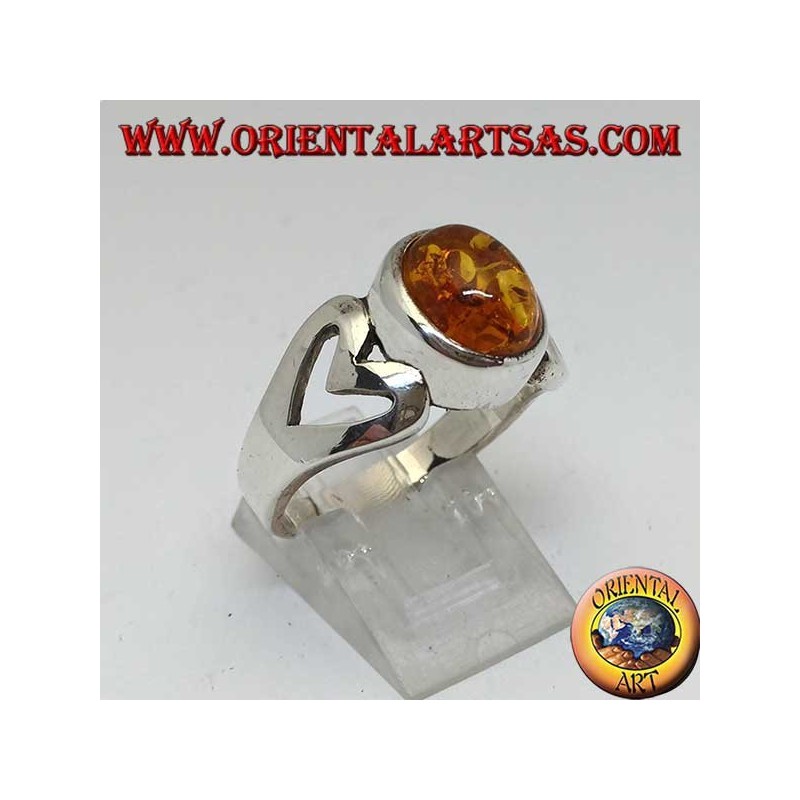 Silver ring with oval amber and openwork heart on the sides