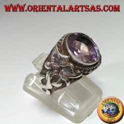 Silver ring with oval natural amethyst with Nepalese dragon on the sides