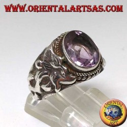 Silver ring with oval natural amethyst with Nepalese dragon on the sides