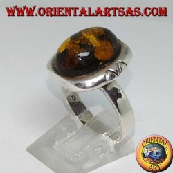 Silver ring with oval green amber and large engraved border
