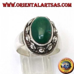 Silver ring with studs around the body, of the oval natural antique Turquoise