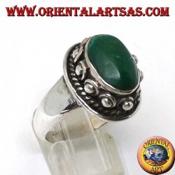 Silver ring with studs around the body, of the oval natural antique Turquoise
