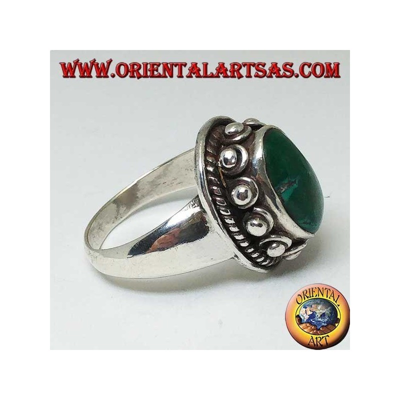 Anillo de plata con tachuelas alrededor del cuerpo, del turquesa natural antiguo ovalado