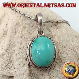 Silver pendant with oval natural turquoise and braided border