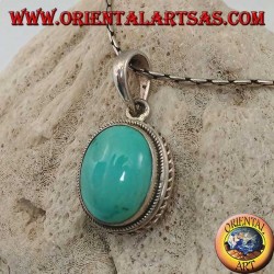 Silver pendant with oval natural turquoise and braided border