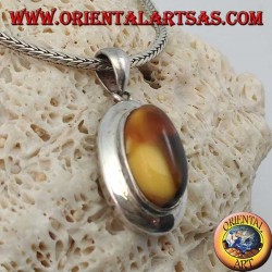 Silver pendant with oval natural Tibetan amber