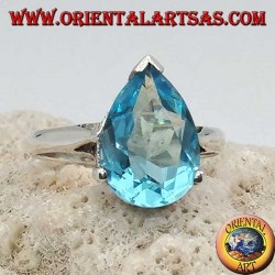 Silver ring with drop-shaped blue topaz with claw setting