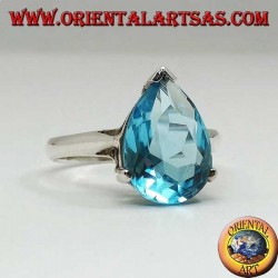 Silver ring with drop-shaped blue topaz with claw setting