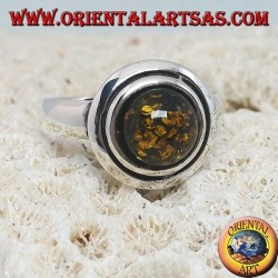 Anillo de plata con ámbar redondo verde abrazado por discos