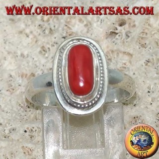 Silver ring with natural coral set in a stone border (handmade)