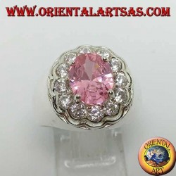 Silver ring with pink faceted oval pink zircon surrounded by brilliant cut zircons