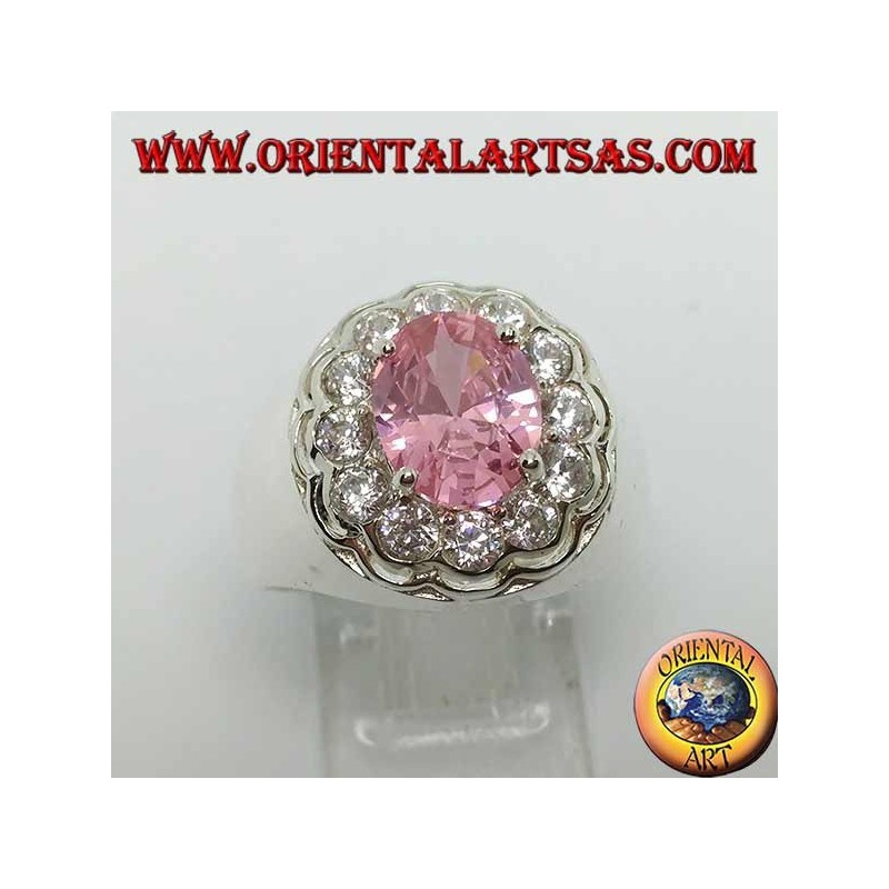 Silver ring with pink faceted oval pink zircon surrounded by brilliant cut zircons