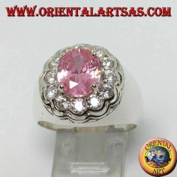 Silver ring with pink faceted oval pink zircon surrounded by brilliant cut zircons