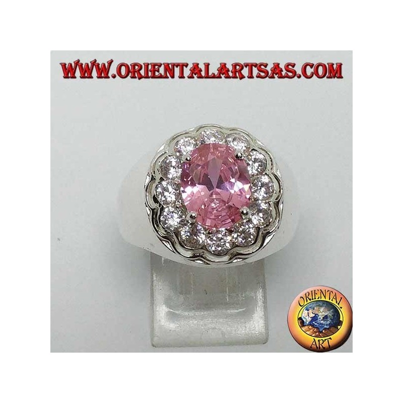 Silver ring with pink faceted oval pink zircon surrounded by brilliant cut zircons