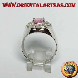 Silver ring with pink faceted oval pink zircon surrounded by brilliant cut zircons