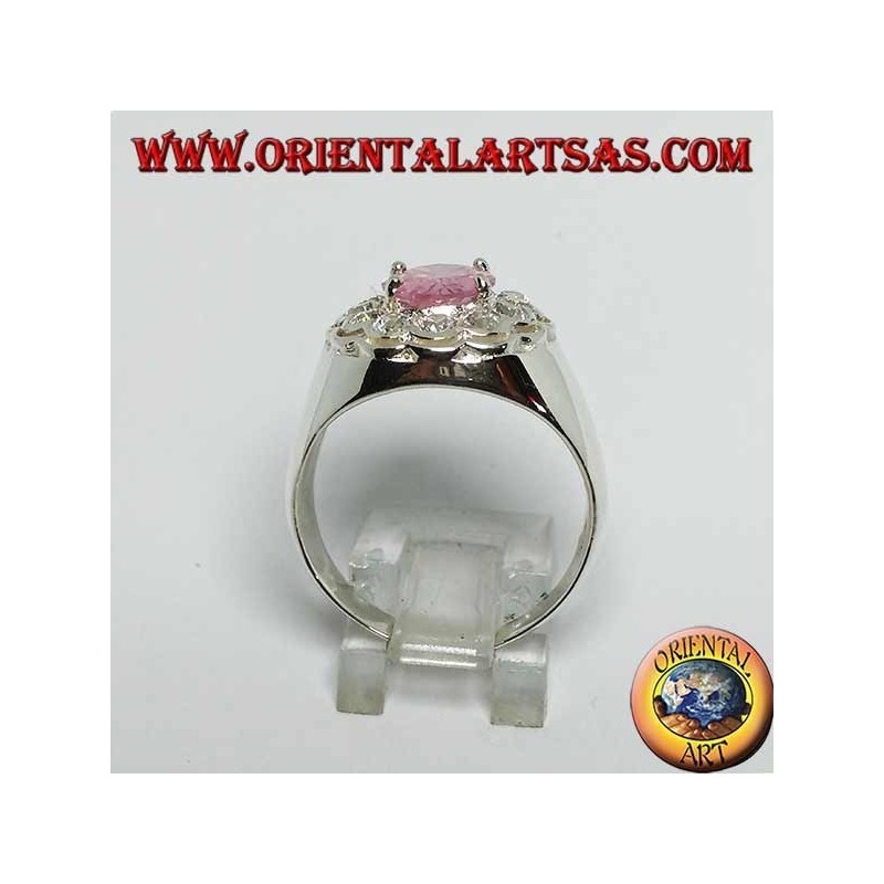 Silberring mit rosa facettiertem ovalem rosa Zirkon, umgeben von Zirkonen im Brillantschliff