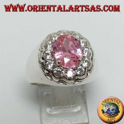 Silver ring with pink faceted oval pink zircon surrounded by brilliant cut zircons