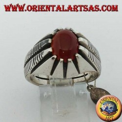 Silver ring with oval carnelian set between eight points