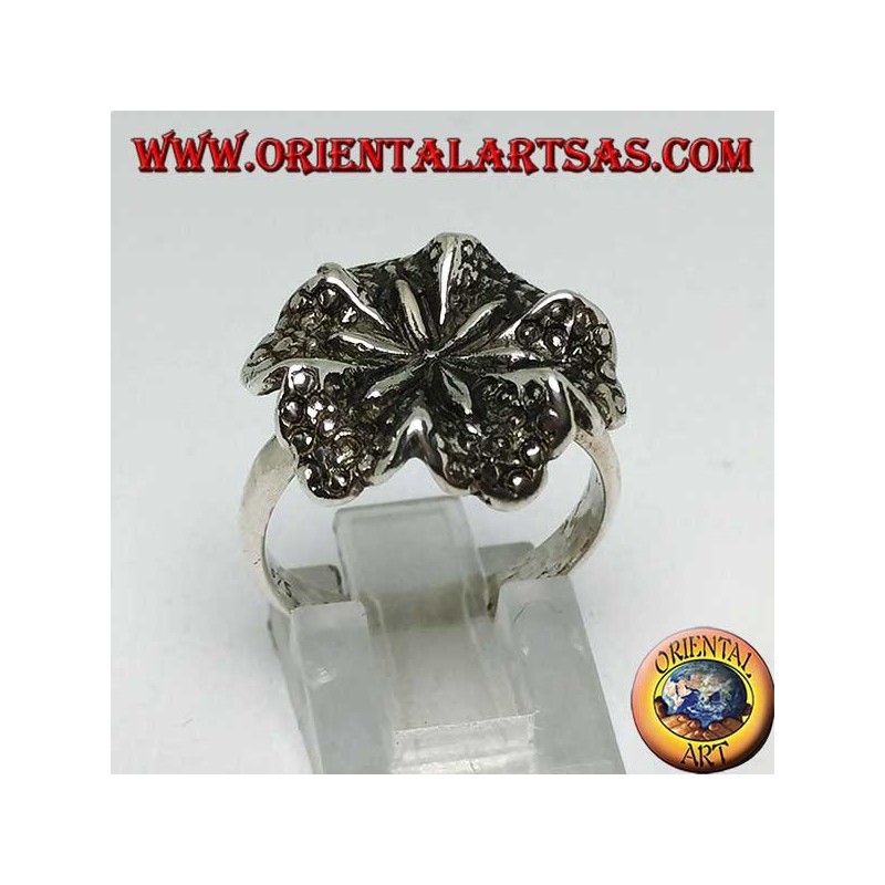Silver ring in the shape of a lily flower, a symbol of purity