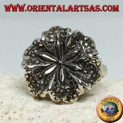 Silver ring in the shape of a lily flower, a symbol of purity