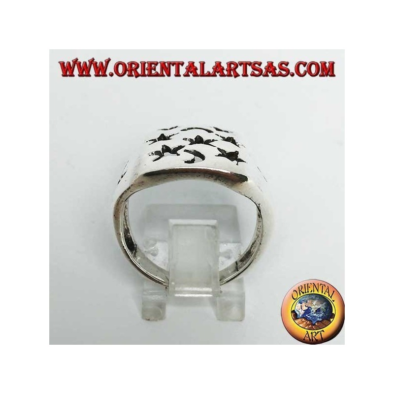 Rectangular silver openwork ring with stars and moons