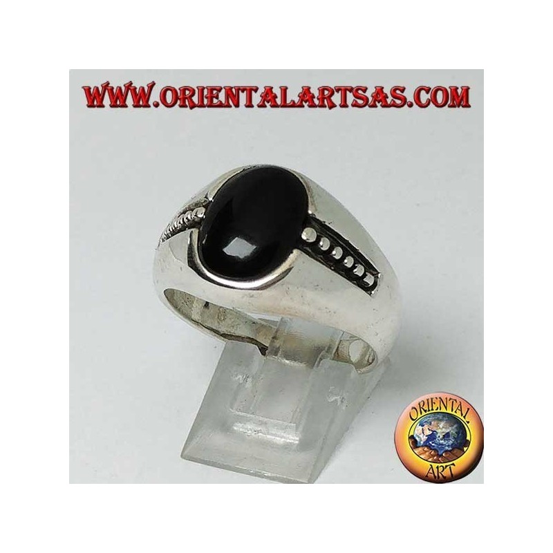 silver ring with oval onyx and bas-relief dots on the sides