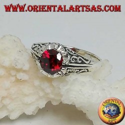 Inlaid silver ring with garnet-colored zircon set
