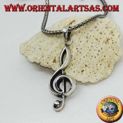 silver pendant treble clef or key of a large sun