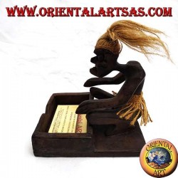 Business card holder with sculpture of a primitive man in teak wood