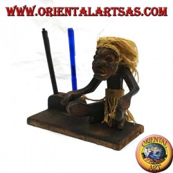 Pen holder with sculpture of a primitive man in teak wood