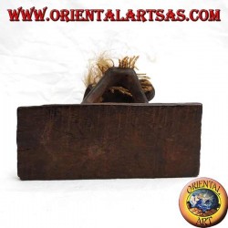 Sculpture of a primitive man guitarist in teak wood