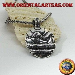 Silver pendant, medal wrapped by a snake