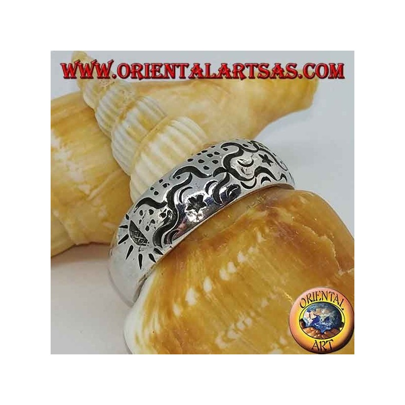 Silver ring with astral engravings