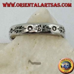 Silver ring with punch engravings