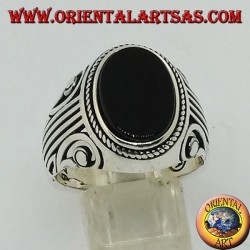 Silver ring with flat oval onyx and a Lira (harp) carved on the sides