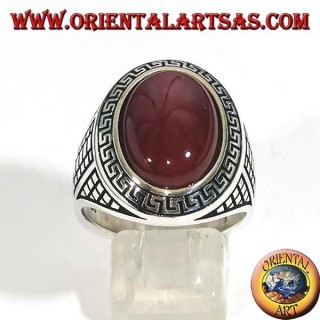 Silver ring with large oval carnelian surrounded by a Greek relief