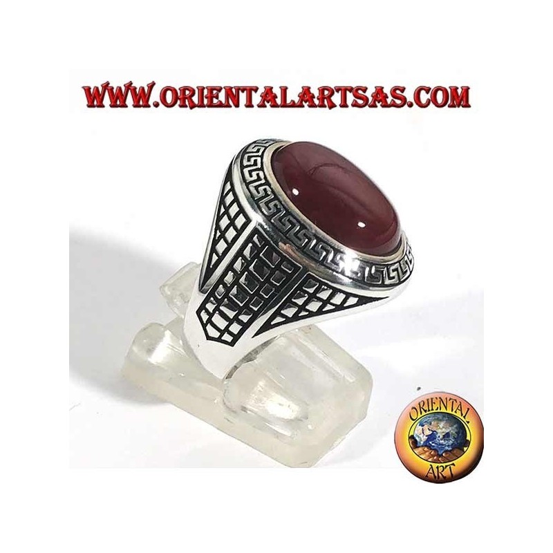 Silver ring with large oval carnelian surrounded by a Greek relief