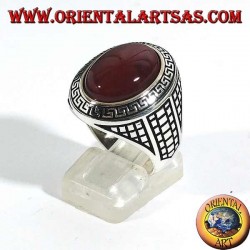 Silver ring with large oval carnelian surrounded by a Greek relief